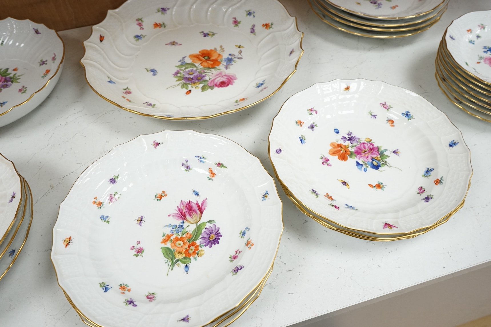 A 19th century Meissen mostly ‘New Brandenstein’ part dinner service. Condition - good